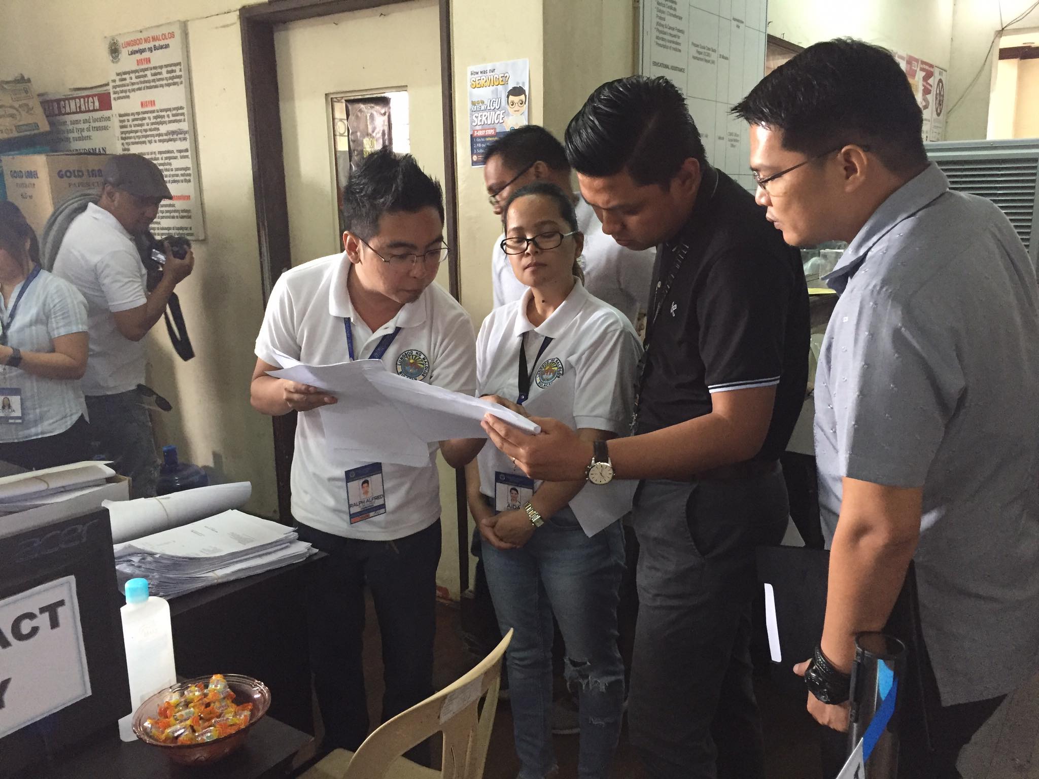 CDD Assistant Division Chief Lee Allen Pineda and LGOO II Rainier Collado during the validation