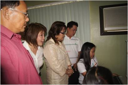 From left: VM Edgardo Yambao of Minalin, PD Angie Blanco of DILG Pampanga, RD Dijan and LGOO VI Algy Canlas look on the installed SIS in the municipality