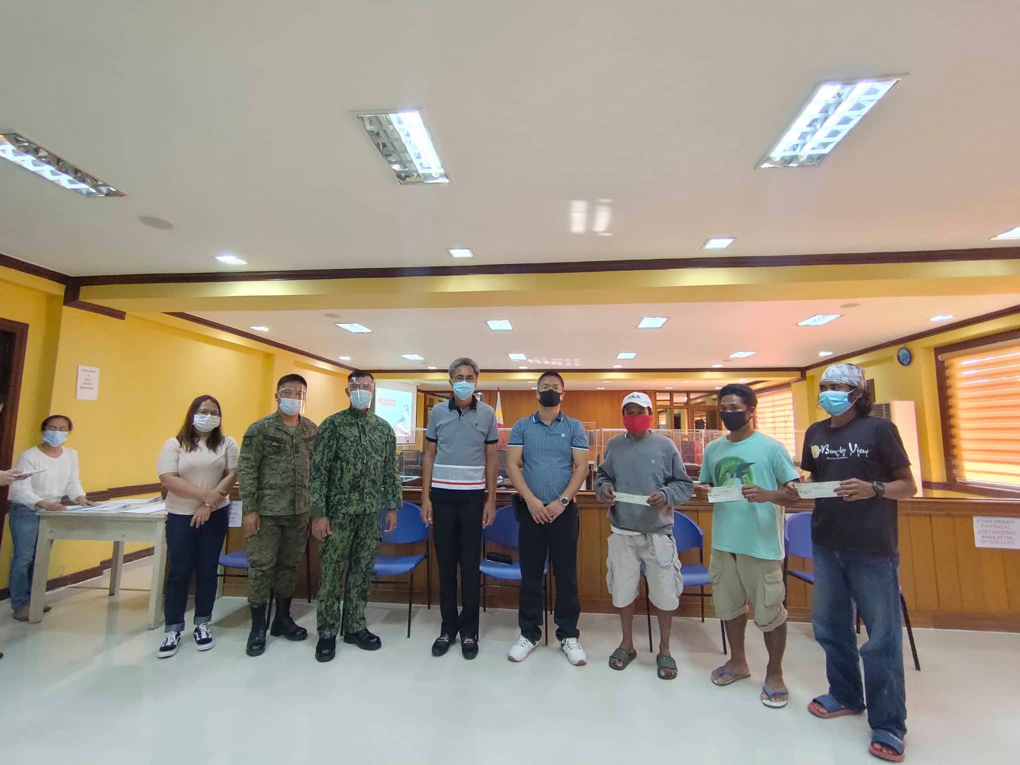 Governor Gerardo A. Noveras , Atty. Ofelio A. Tactac, Jr., DILG Aurora Provincial Director, MAJ Sagersanti C. Estrada, EX-O, AFP, 91IB, 71D, PA, PCol Raul Siriban, PD PNP Aurora and Ms. Abigaiel Paulino of PSWDO, during the awarding ceremony for the former rebels during the conduct of the E-CLIP Awarding at the Sangguniang Panlalawigan Hall, Provincial Capitol Compound, Baler, Aurora.