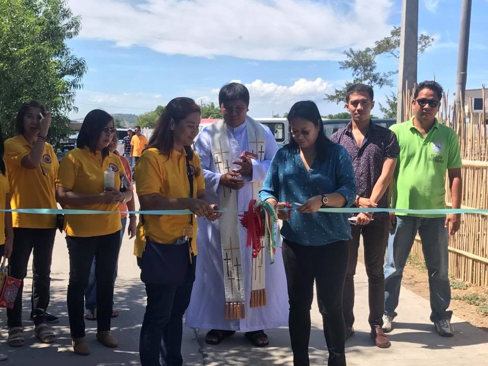 Hon. Jocelyn Apostol together with PD Armi V. Bactad, CESO V leads the ribbon cutting ceremony of Core Local Access Road in Barangays Camiing and Lomboy, Cabangan